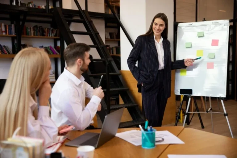 Finance consultants reviewing commercial development financing plans for property projects