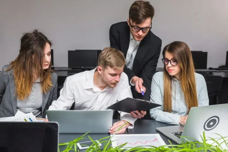 Finance consultants reviewing Canadian capital service options across multiple lending markets